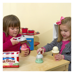 Kids playing with ice cream set