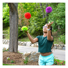 Load image into Gallery viewer, Child playing with Koosh Mondo