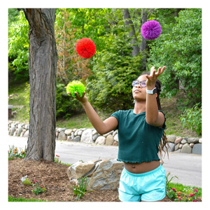 Child playing with Koosh Mondo